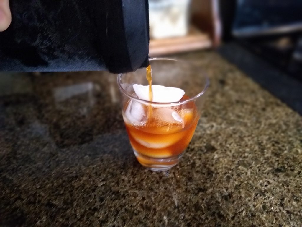 pour hyperchilled coffee over a glass of ice